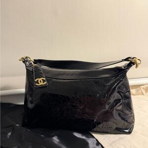 Vintage Chanel black patent leather perforated CC baguette shoulder bag
